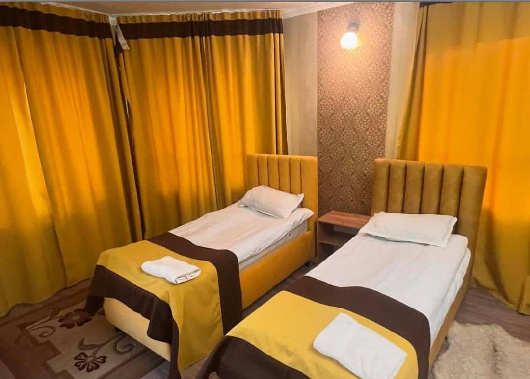 Turan Guesthouse Karakol Bagian luar foto